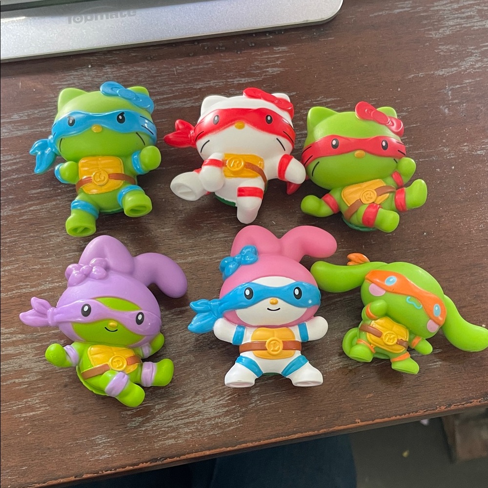 McDonald’s Happy Meal set of 6 Hello Kitty Mutant ninja turtles figures.
